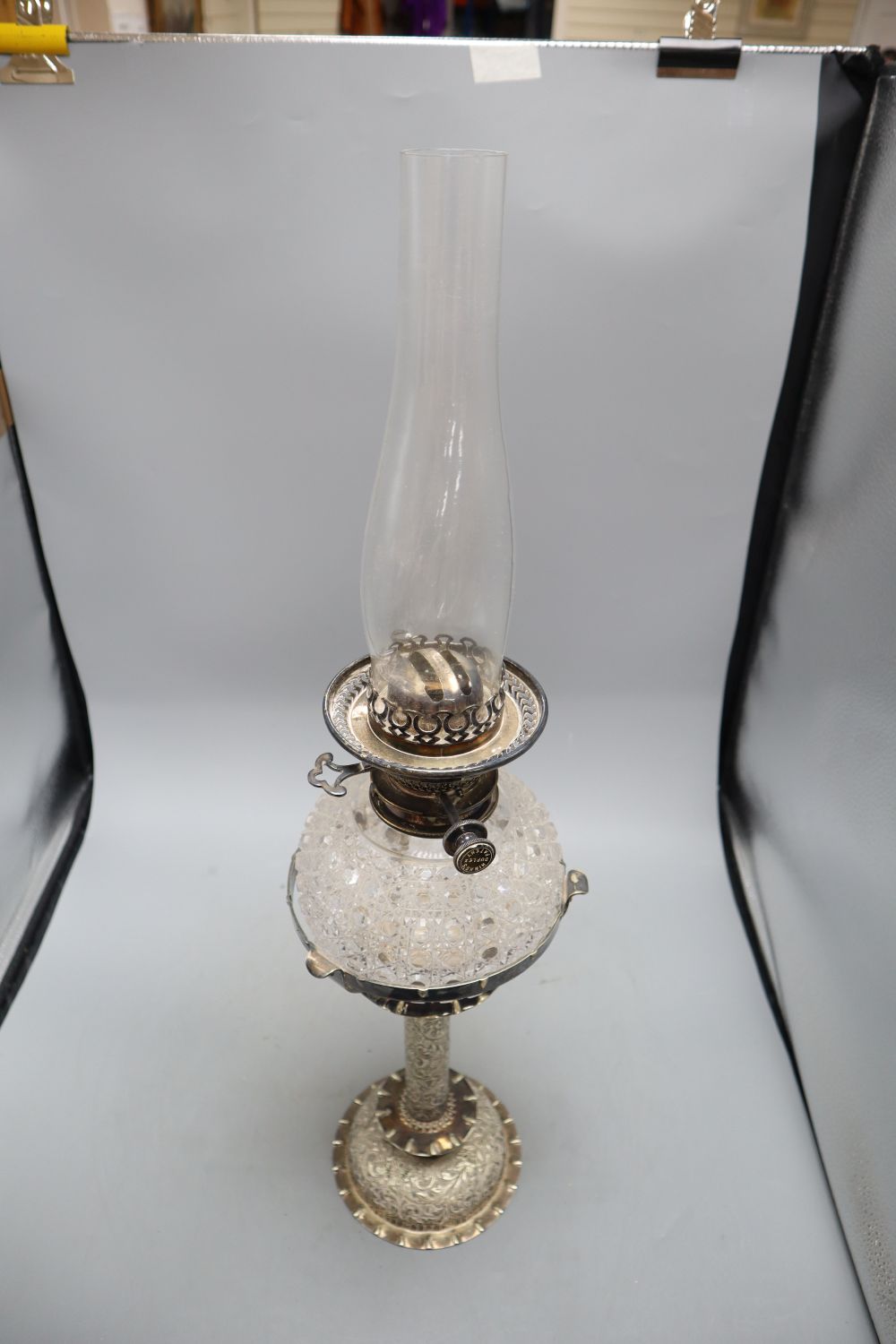 A 19th century Hinks & Son silver plate and cut glass oil lamp, overall height 68cm incl. chimney